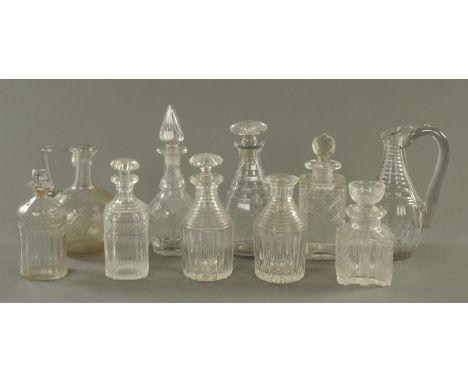 Ten cut glass decanters, 18th century and later, (some with faults and losses).  Tallest 28.5 cm.    CONDITION REPORT:  The s