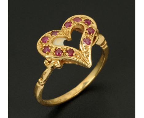 A 9 ct gold ring, heart shaped, with ruby coloured stones, size N, 2.6 grams gross. 