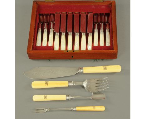 A silver plated stilton scoop and pickle fork, fish servers, late 19th century, each with silver mount, Sheffield 1897, and i