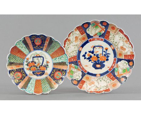 A Japanese Imari scallop shaped charger, mid 19th century, decorated to the centre with a basket of peonies and bamboo agains