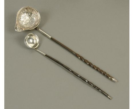 A silver toddy ladle, London 1834, and a silver coloured metal toddy ladle (unmarked), each with spiral twist baleen handle. 