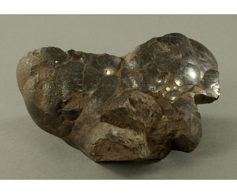 A boulder of kidney stone (haematite).  Width 22 cm, height 14 cm (see illustration).