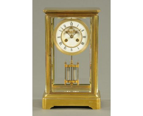 A brass cased four glass mantle clock, late 19th century, the enamelled dial with Roman numerals and brocot movement on displ