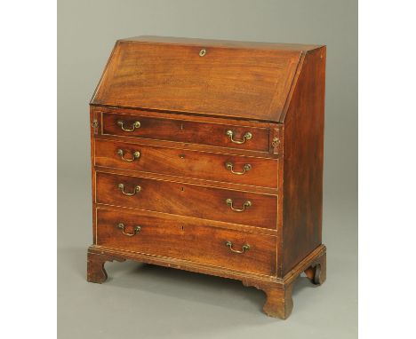 A George III mahogany bureau, with slope front to fitted interior and with four long graduated drawers with brass drop handle