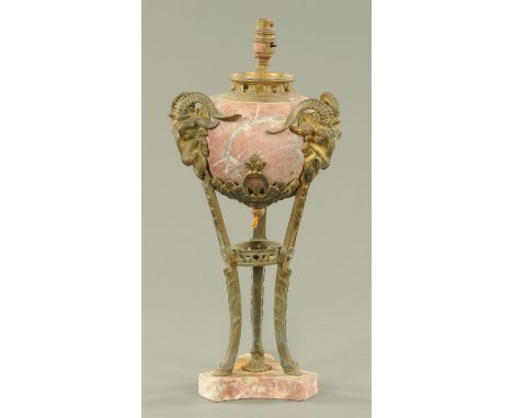 A rouge marble and bronze mounted table lamp, with pierced gallery on a bulbous marble body, mounted with gilt bronze rams ma