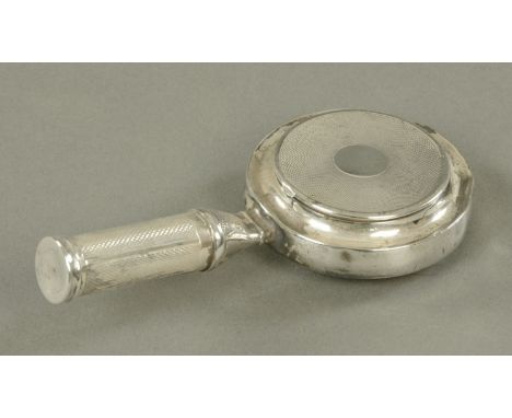 A French novelty compact, early 20th century, in the form of a warming pan, with engine turned decoration, the handle enclosi