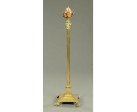 A brass column telescopic lamp, 19th century, with brass reservoir on a Corinthian capital reeded column on square stepped ba