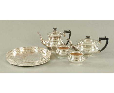 An Elkington silver plated four piece tea and coffee service, 20th century, with ebony handles and finials, and a silver plat