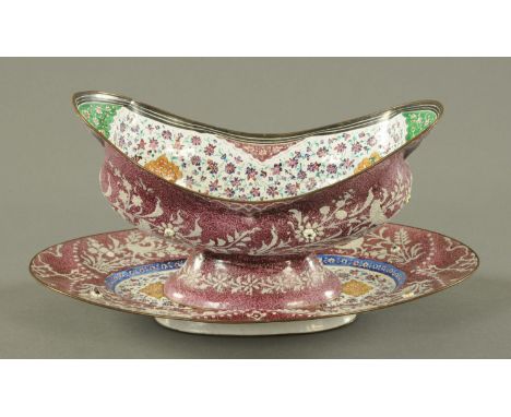 A Persian enamel ovoid bowl on stand, 20th century, the interior decorated with a scene of Khajoo Bridge against a floral bor