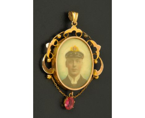 A 9 ct gold pendant locket, early 20th century, housing an oval portrait miniature on ivory of a Naval Officer and with chain