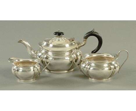 A three piece tea service, Sheffield 1934, 1154 grams gross (see illustration).  