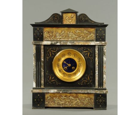 A black slate and variegated marble mantle clock, late 19th century, architectural form with inset embossed brass panels depi