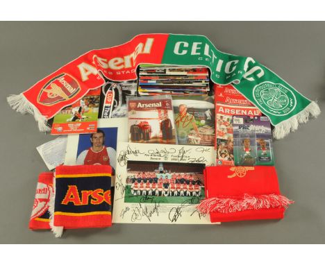 An Arsenal Football Club 2000-2001 Season signed photograph, a signed photograph of Robert Pires and three Arsenal scarves an
