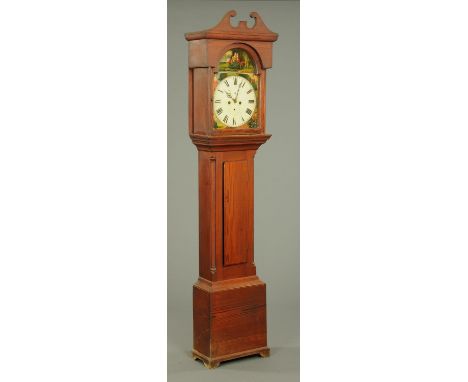 An early 19th century pine longcase clock, with arched painted dial, long trunk door and raised on bracket feet.  Height 122 