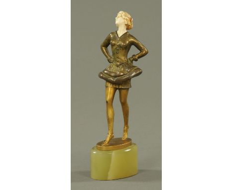 An Art Deco bronze and ivory figure, lady, early 20th century, in the manner of Josef Lorenzl, the head tipped to one side an