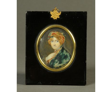 A 19th century portrait miniature on ivory, oval, gentleman wearing Eastern dress.  70 mm x 60 mm, ebonised frame, foliate ha