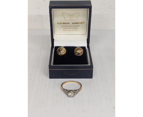 A yellow metal ring inset with a diamond, together with a pair of 9ct gold earrings, total weight 4.3gLocation: 