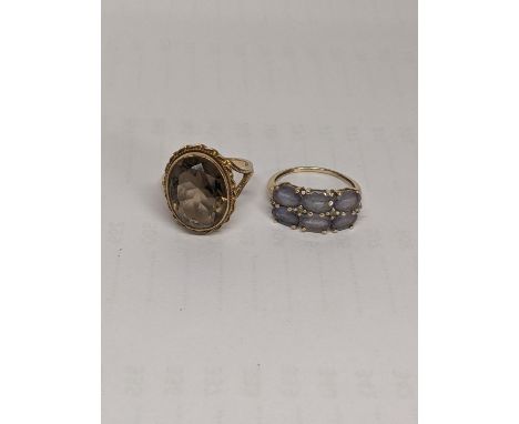A 9ct gold six stone ring together with a 9ct gold citrineLocation: 
