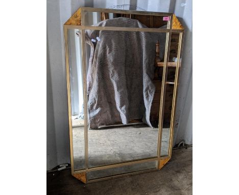 A contemporary octagonal framed wall hanging mirror having a metal frame and birdseye maple corners, 120.5h x 80w, together w
