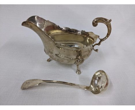 A silver sauceboat 240g, and a Scottish silver sauce ladle 33g Location: Porters 