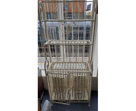 A cream painted folding metal shelf unit having three shelves and two cupboard doors with scrolled sides, 140cm h x 60cm w x 