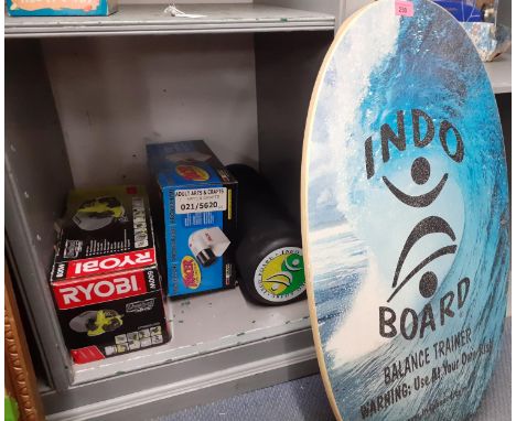 A mixed lot to include an Indo balance board, a Ryobi 600w planer in original box, a Tracer projector in original box and a b