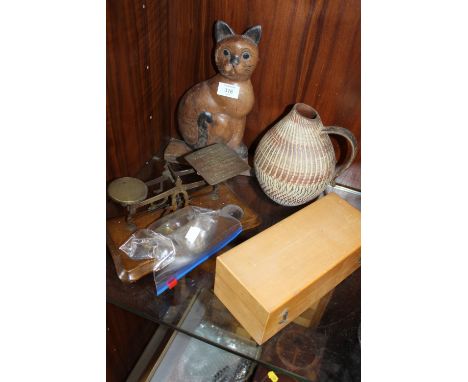 A SET OF VINTAGE SCALES AND WEIGHTS, TOGETHER WITH A CASED SET OF WEIGHTS, WOODEN CAT FIGURE AND A DEE-CEE JUG (4)