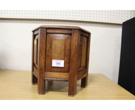 A HEXAGONAL MAHOGANY PLANTER ON LEGS - H 23.5 CM 