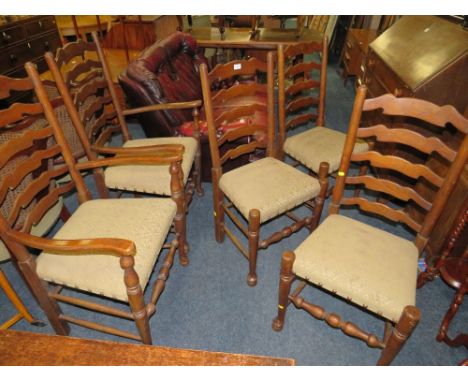 A SET OF SIX OAK LADDER BACK DINING CHAIRS