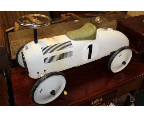 A VINTAGE STYLE CHILDS RIDE ON VILAC TOY CAR