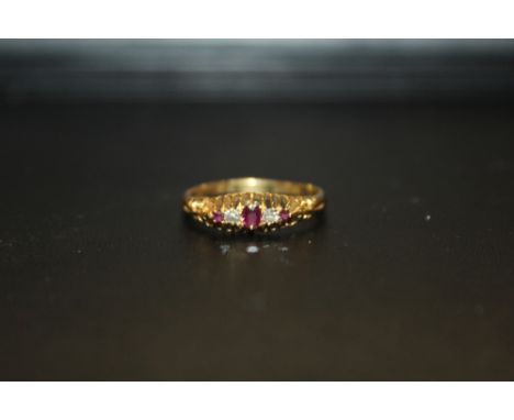 A HALLMARKED GOLD FIVE STONE RUBY AND DIAMOND RING HALLMARKS INDISTINCT - APPROX WEIGHT 3.1G