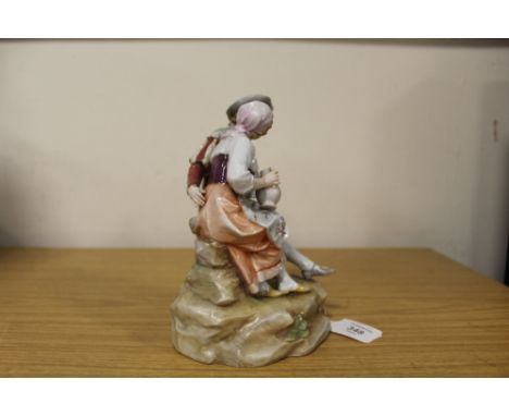 A CONTINENTAL CERAMIC FIGURE GROUP 