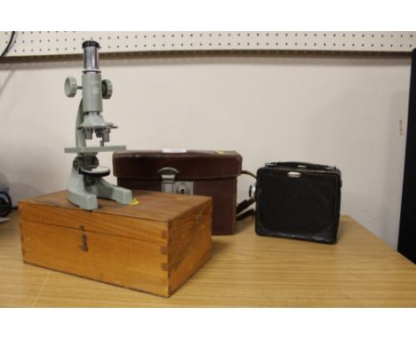 A CORONET VINTAGE  CINE CAMERA TOGETHER WITH A CASED MICROSCOPE (2)