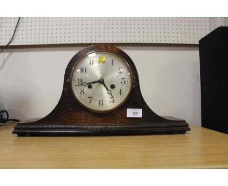 A VINTAGE OAK NAPOLEON HAT MANTLE CLOCK