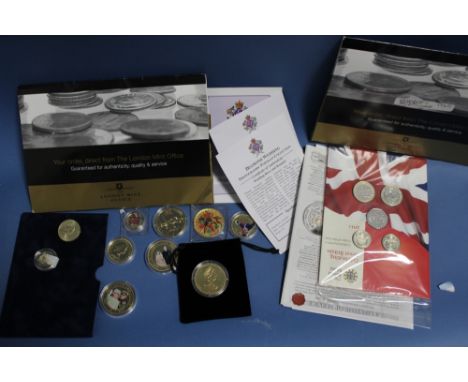 A COLLECTION OF LONDON MINT GOLD PLATED AND ENAMEL COINS TO INCLUDE AN ELIZABETH II ONE DOLLAR COOK ISLANDS COIN