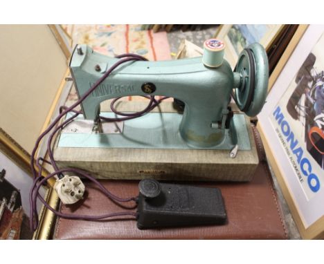 A CASED VINTAGE UNIVERSAL SEW LOK SEWING MACHINE