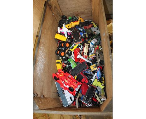 A LARGE QUANTITY OF PLAY WORN DIE CAST TOY CARS ETC. CONTAINED IN A VINTAGE WOODEN BOX 