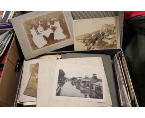A SUITCASE OF VINTAGE BLACK AND WHITE PHOTOGRAPHS 