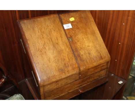 A VINTAGE OAK LETTER RACK - HEIGHT 31CM - WIDTH 38CM - DEPTH 22CM