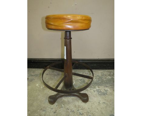 A VINTAGE STYLE CAST BAR STOOL