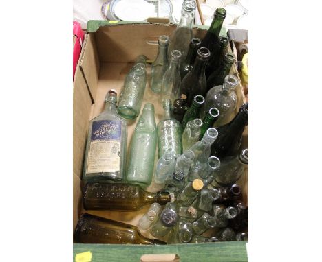 A COLLECTION OF VINTAGE GLASS BOTTLES 