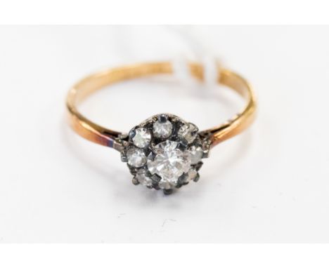 A diamond flower head cluster 18 ct yellow gold ring approx. 0.36 ct spread, ring size approx. 'K' 