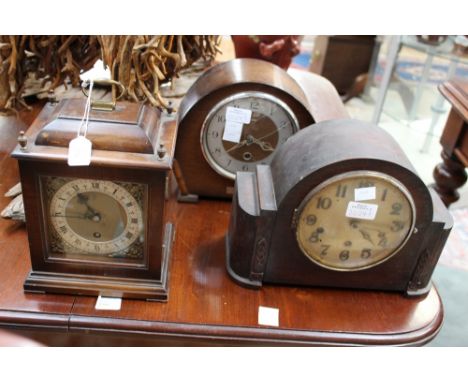 An Astral of Coventry clock, circa 1920, marked 123, an Enfield 1949 oak mantel clock, plus an Art Deco Haller mantel clock (