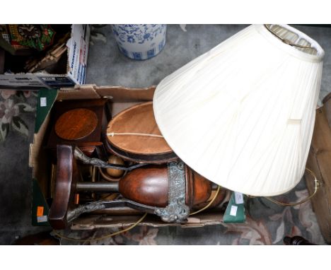 A box of treen including a table lamp, needlework tray, coasters, two mantel clocks etc 