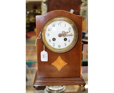  An Edwardian table or mantel clock, with inlay detail