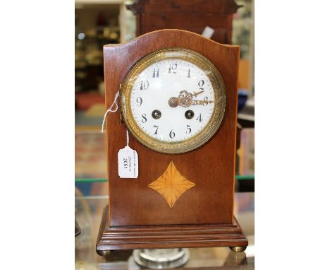  An Edwardian table or mantel clock, with inlay detail