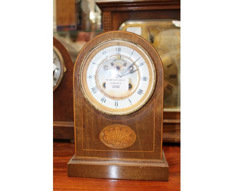 A mahogany mantel clock, inlaid with satinwood, having Roman numerals to enamelled dial, pendant, but no key