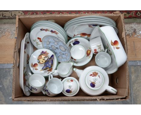 A collection of Royal Worcester 'Evesham' including tea and dinner ware, two Royal Crown Derby paperweights (one gold and one