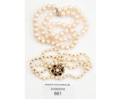  Two pearl necklaces, one with silver clasp, one with 9 ct gold clasp, inlaid with garnets