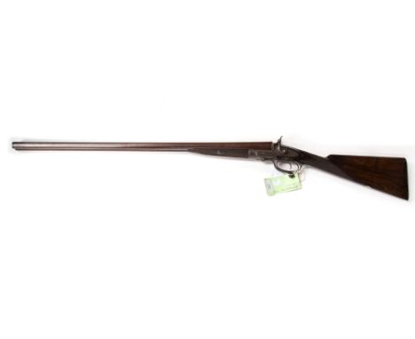 A 12 bore 2 1/2" chambered hammer nitro proved side lock shotgun by J. E. Roberts of Bristol, fitted with damascus barrels an